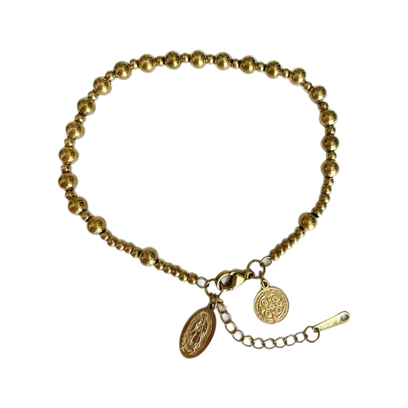 Pulsera San Benito y Virgen dorada