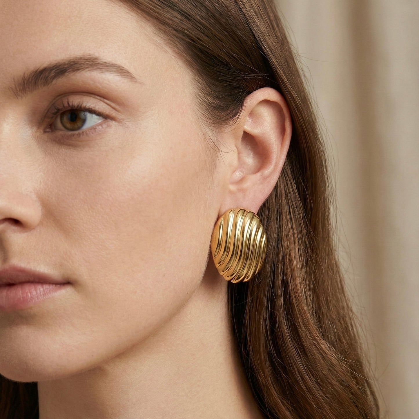 Aretes óvalo líneas