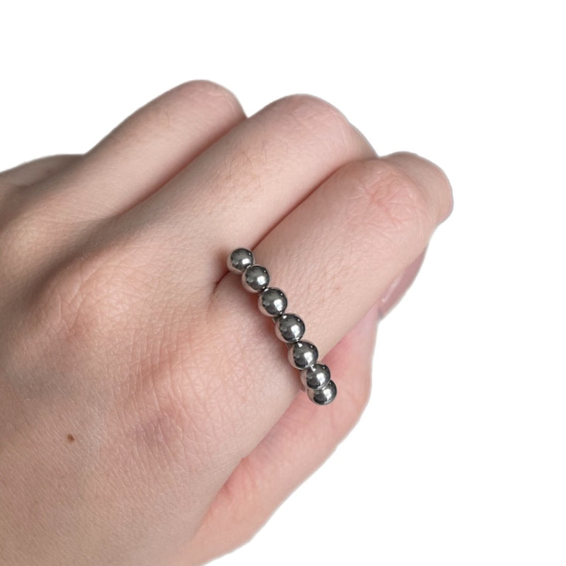 Anillo bolitas plateado