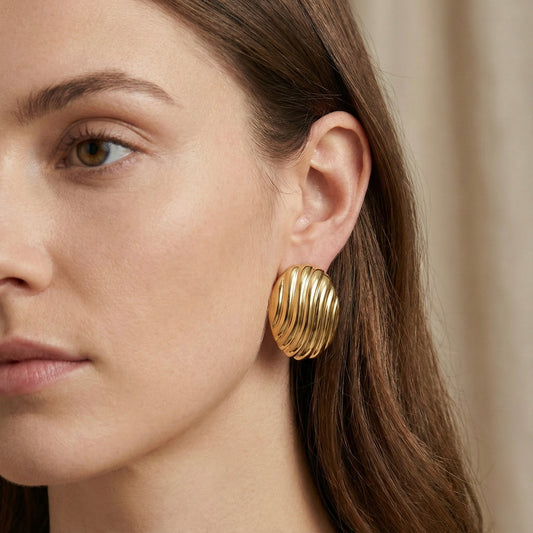 Aretes óvalo líneas