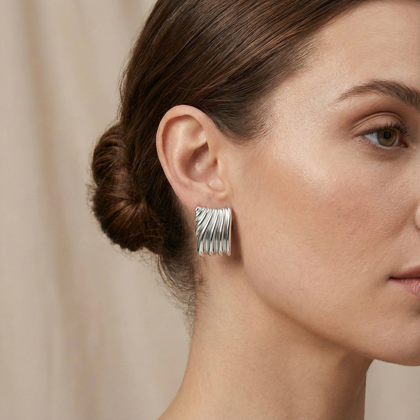 Aretes Ere plateados