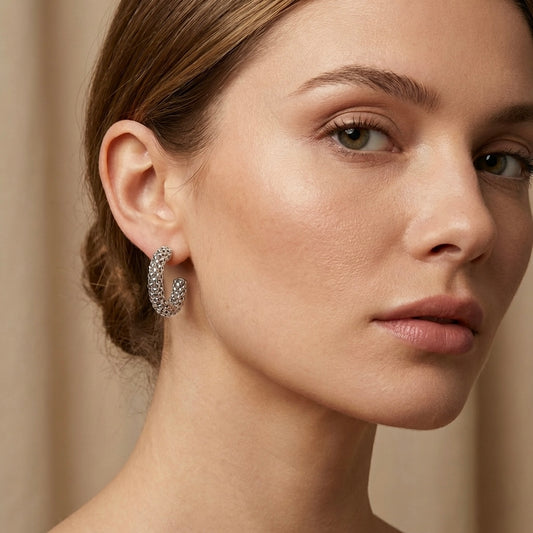 Arracadas tejidas plateadas